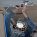 USS Blue Ridge Sailors perform corrosion control maintenance