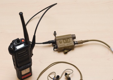 100th AMXS, 100th MXS test innovative in-ear headset