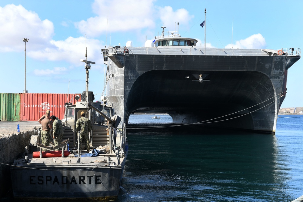 US Sailors and Cabo Verde Coast Guard Conduct Small Boat Maintenance