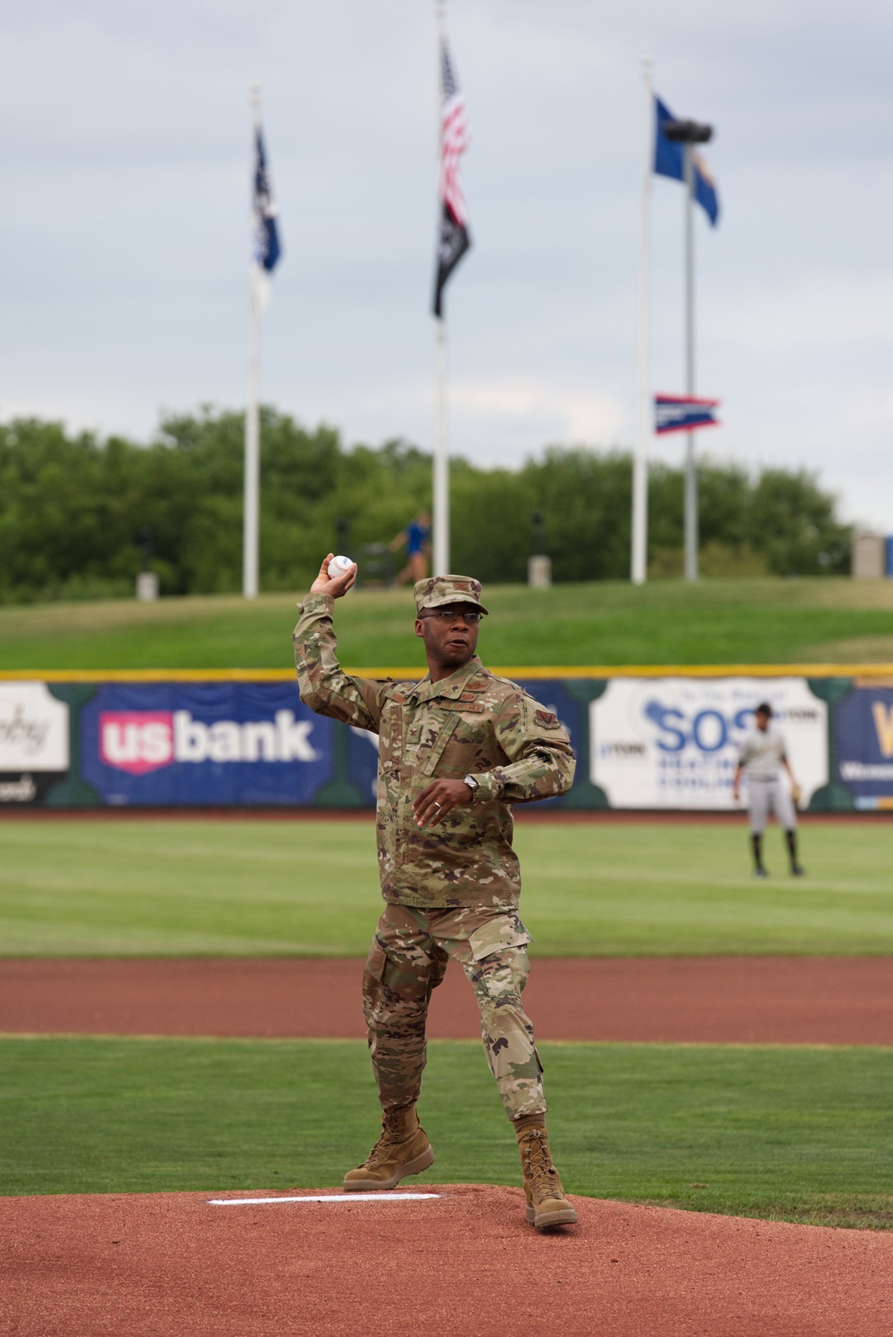 55th Wing Commander throws first pitch at Omaha Storm Chasers game