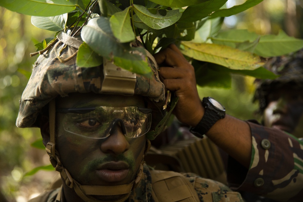 U.S. Marines and sailors conduct a jungle patrol during CARAT Indonesia