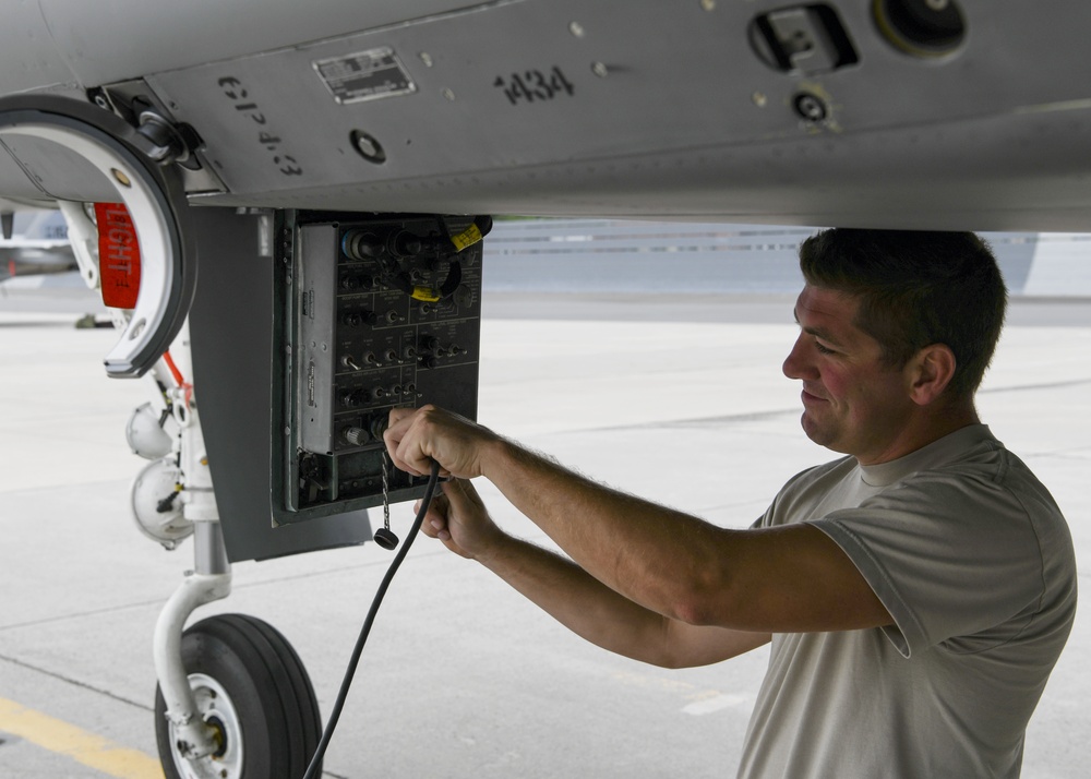 104th Fighter Wing crew chief prepares F-15 Eagle for launch