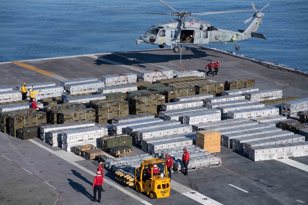 MH-60S Sea Hawk conducts ammo offload
