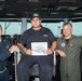 U.S. Sailors pose for a photograph
