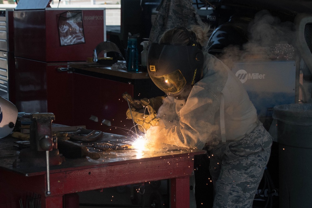 Air Guardsmen train on welding techniques during their annual training