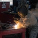Air Guardsmen train on welding techniques during their annual training