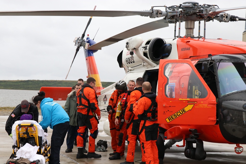Coast Guard aircrew rescues 3 from small skiff in Holtham Inlet, Alaska