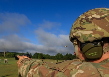 Spc. Collin George fires M9