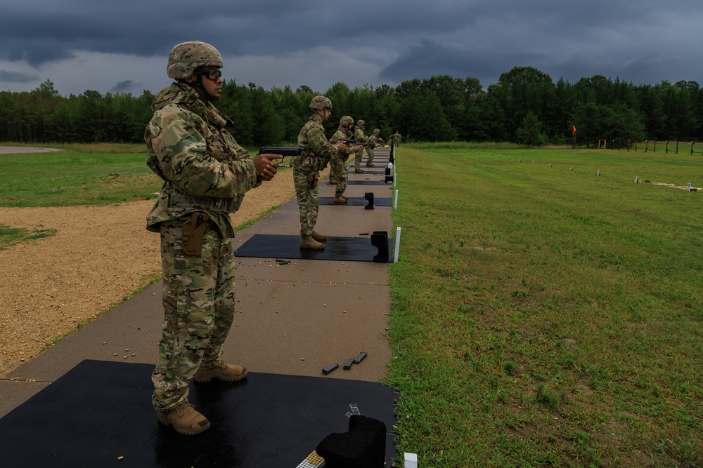 U.S. Army Reserve Best Warriors and Drill Sergeants of the Year prepare to fire an M9