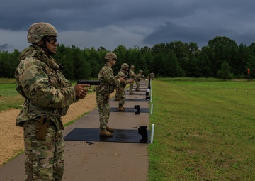 U.S. Army Reserve Best Warriors and Drill Sergeants of the Year prepare to fire an M9