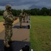 U.S. Army Reserve Best Warriors and Drill Sergeants of the Year prepare to fire an M9