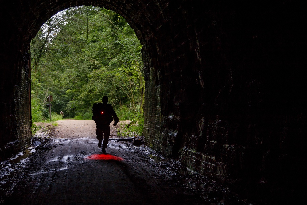 A U.S. Army Reserve Reserve soldier enters a tunnel