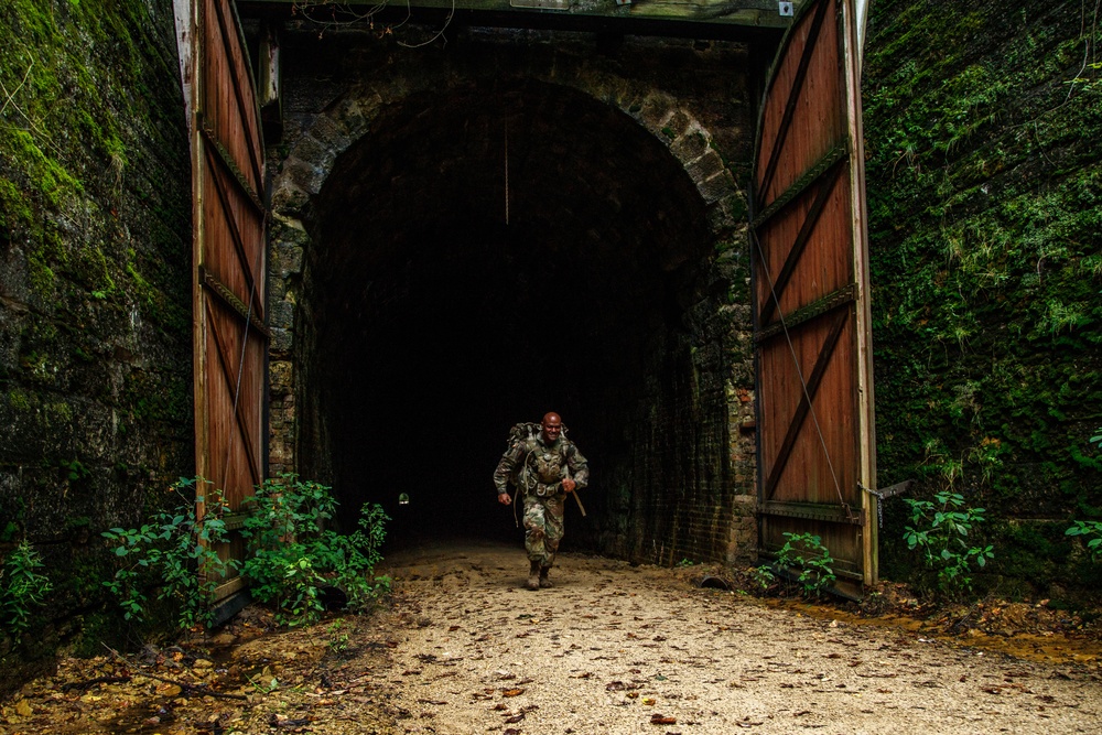 Sgt. Edward Singh emerges from a tunnel