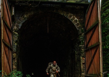 Sgt. Edward Singh emerges from a tunnel