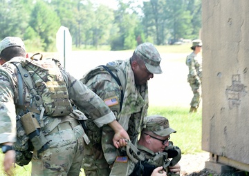 Army Reserve observer coach/ trainers ready infantry Soldiers during Army Total Force exercise
