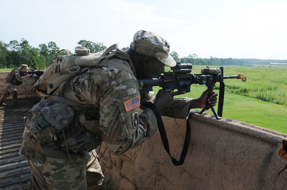 Army Reserve observer coach/ trainers ready infantry Soldiers during Army Total Force exercise