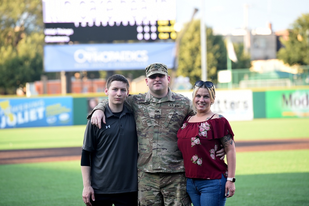 Soldier receives honor throwing in a first pitch at Joliet Slammers home game