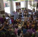 Camp Pendleton USO hosts story party with voice actors Tara Strong, Greg Cipes