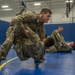 Spc. Collin George practices Modern Army Combatives with Spc. Kalon Williams