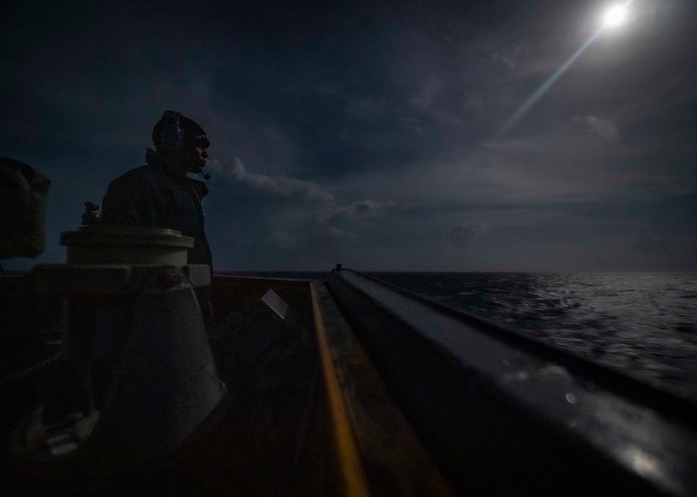 USS Gridley Sailor stands watch