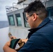 USS Gridley Sailor Checks Weather