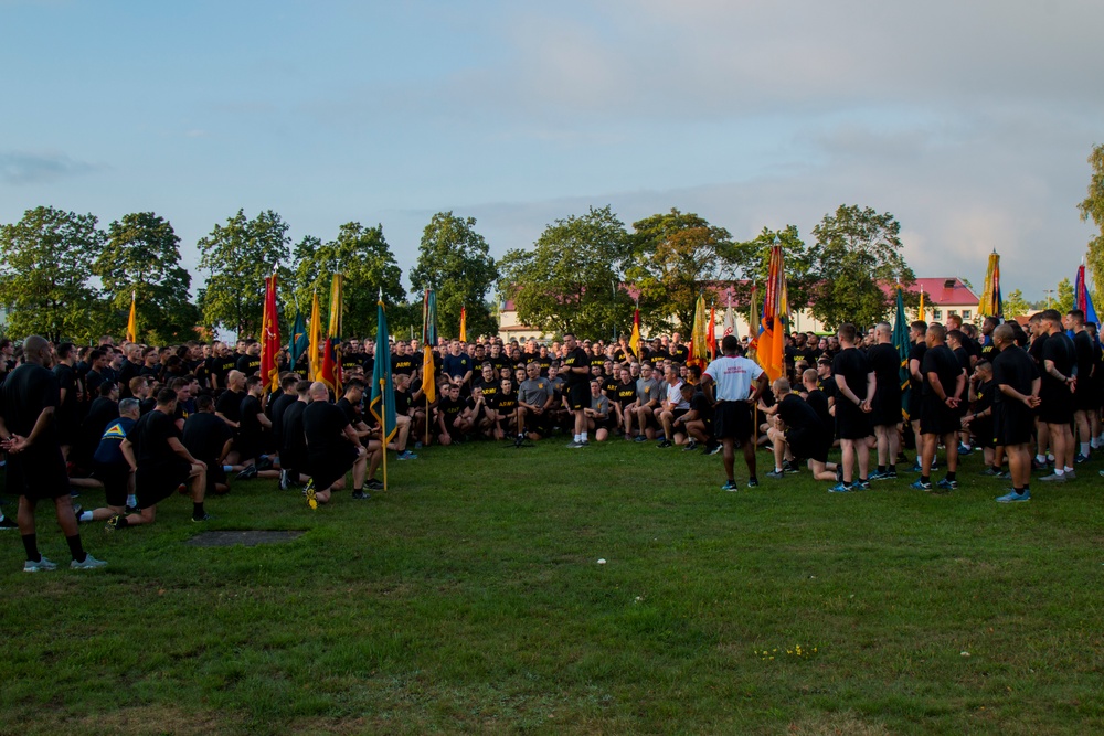 Brig. Gen. Christopher Norrie addresses Soldiers from 7th Army Training Command (7 ATC) after completing the Jäger Run in Grafenwoehr, Germany, August 16, 2019.