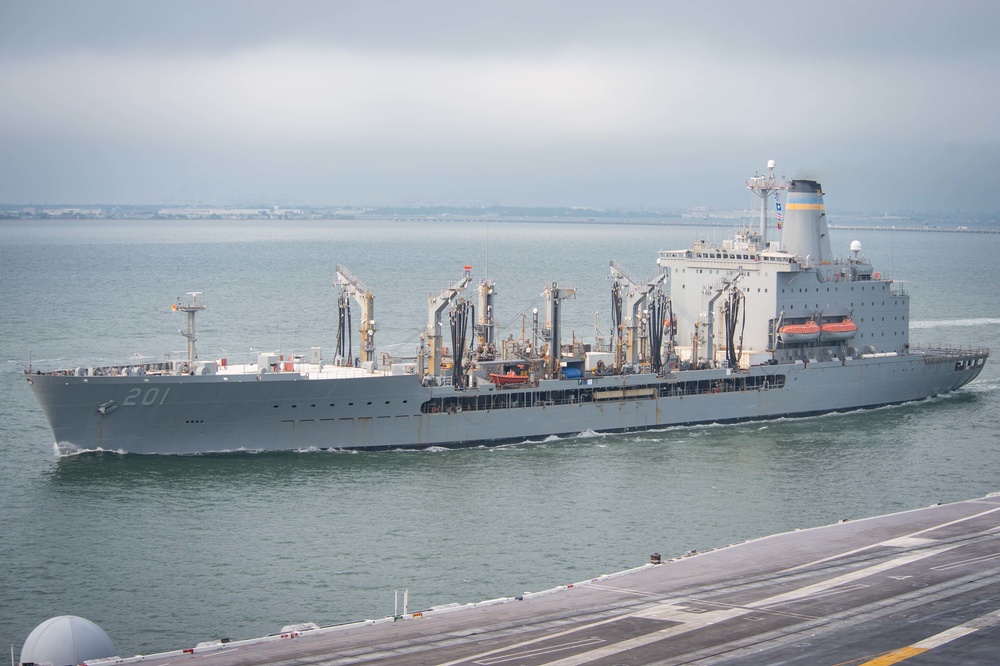 The underway replenishment oiler USNS Patuxent (T-AO-201) steams past