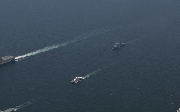 U.S. Navy and Coast Guard Sail in formation with the Malaysian Navy and Coast Guard