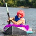 Airmen participate in a cardboard regatta
