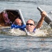 Airmen participate in a cardboard regatta