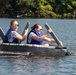 Airmen participate in a cardboard regatta