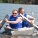 Airmen participate in a cardboard regatta