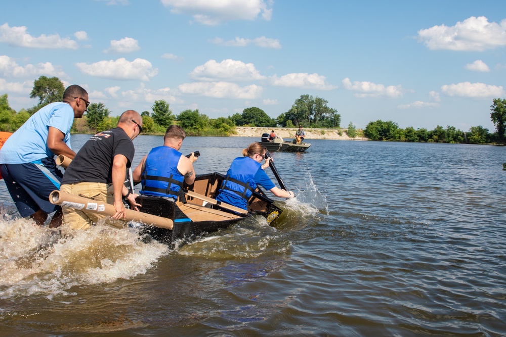 Airmen participate in a cardboard regatta