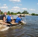 Airmen participate in a cardboard regatta