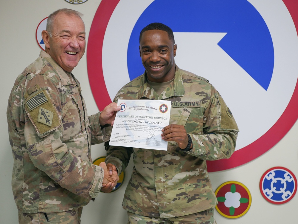Lt. Holliday Receives Wartime Patch