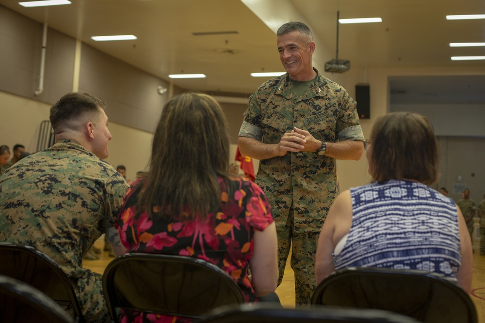 Col. James L. Shelton Jr. awards Lance Cpl. Braxton A. Goff with a Navy Achievement Medal