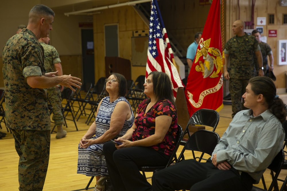 Col. James L. Shelton Jr. awards Lance Cpl. Braxton A. Goff with a Navy Achievement Medal