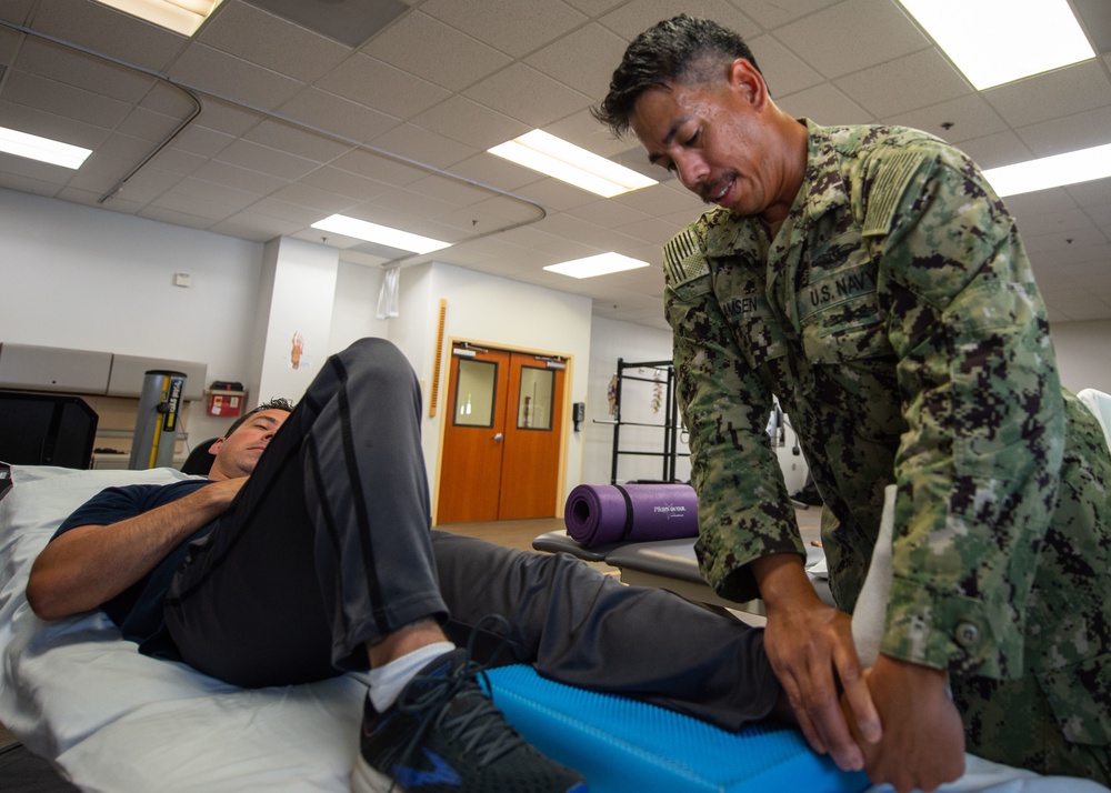 Corpsman helps patient