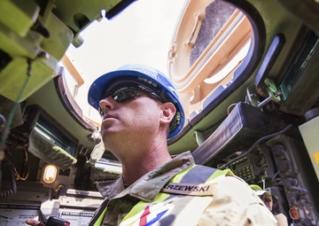 Vehicle quality assurance experts keep APS-5 ready to roll