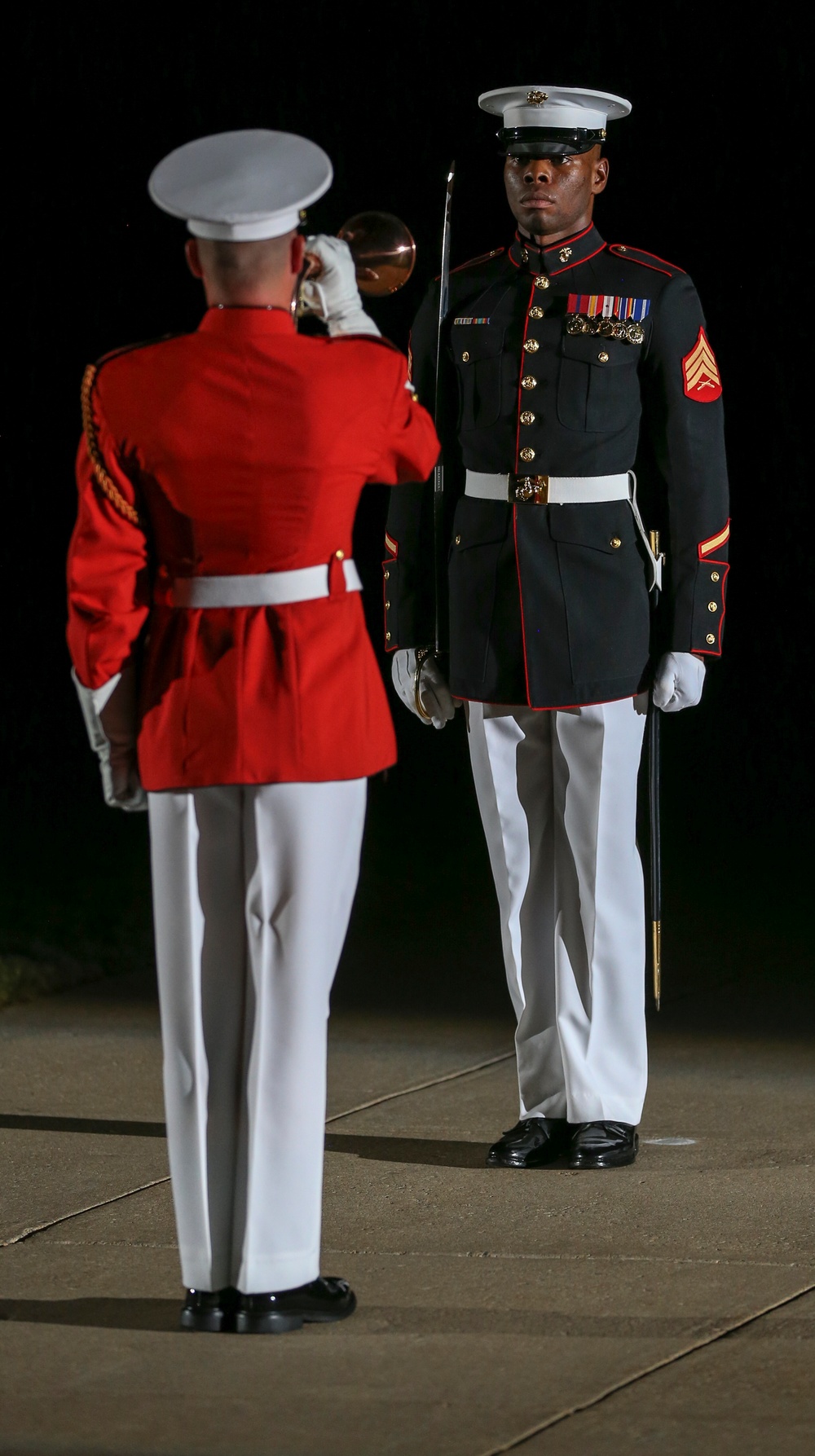 Marines march in Noncommissioned Officer Friday Evening Parade