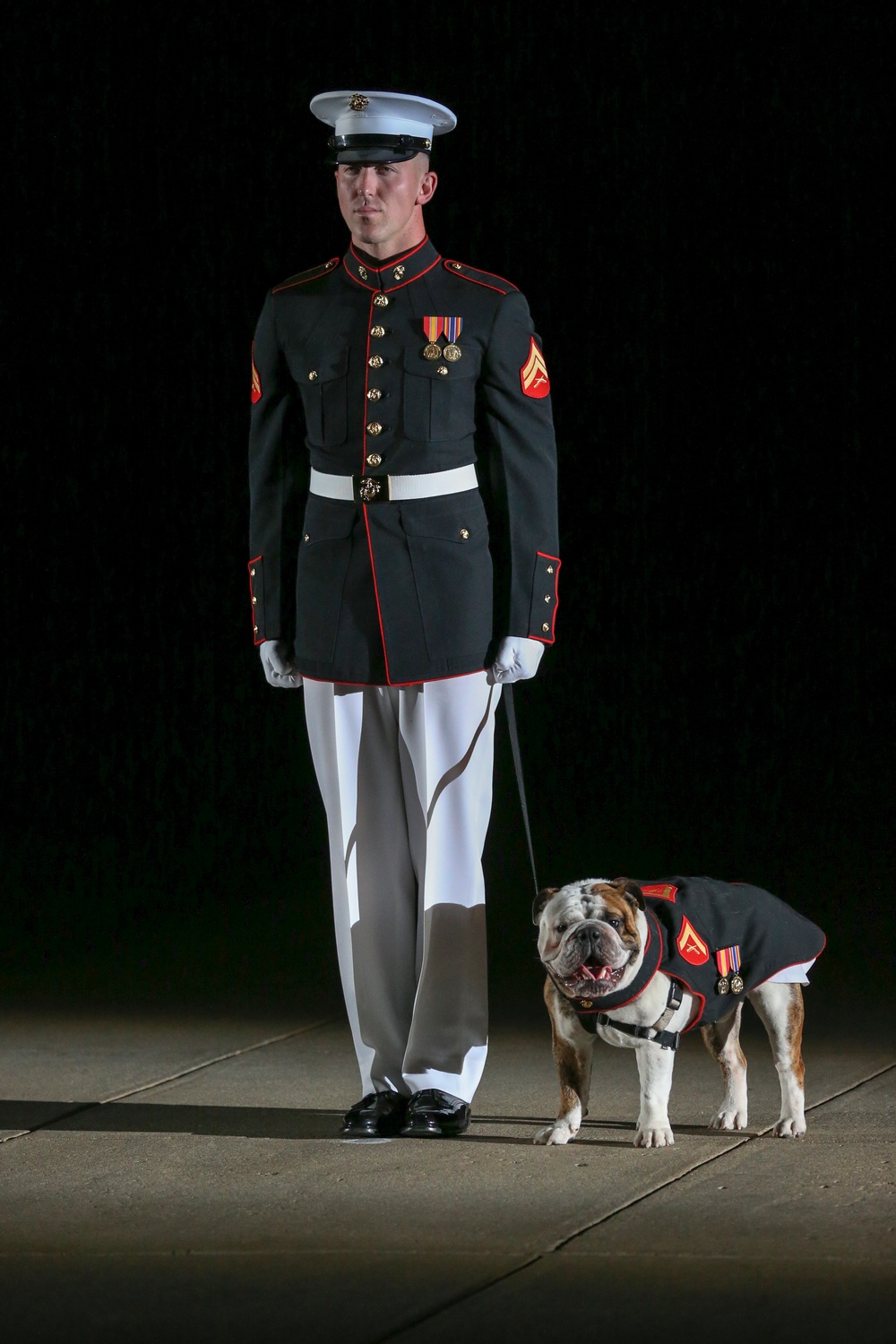 Marines march in Noncommissioned Officer Friday Evening Parade