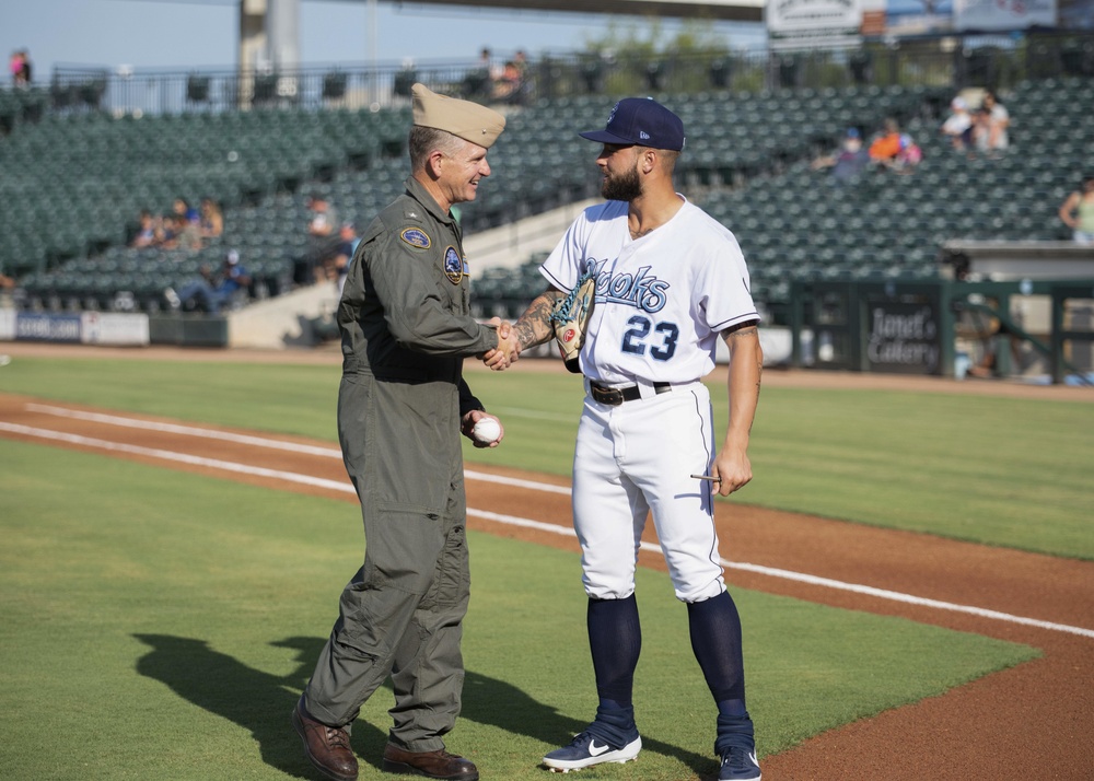 Chief of Naval Air Training Rear Adm. Dan Dwyer throws out first pitch during Corpus Christi Hooks game
