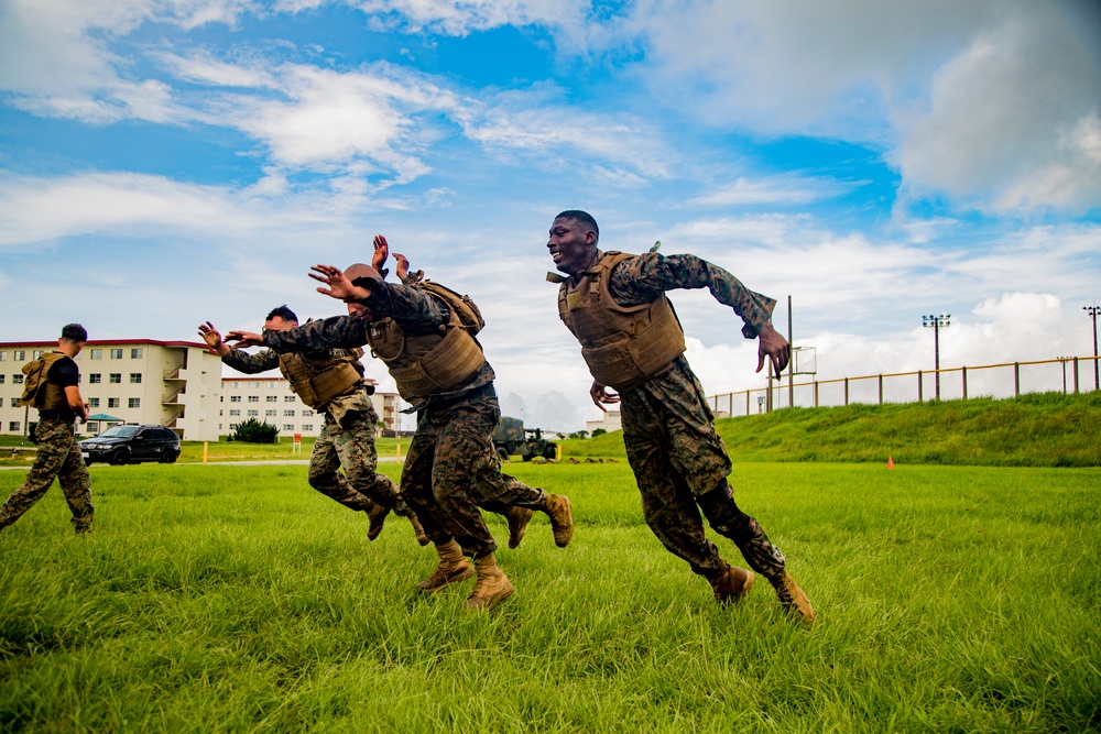 Martial arts instructor hopefuls complete o-course workout