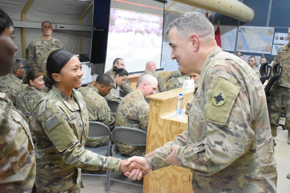 129th CSSB Soldiers Receive Coins from BG Walker