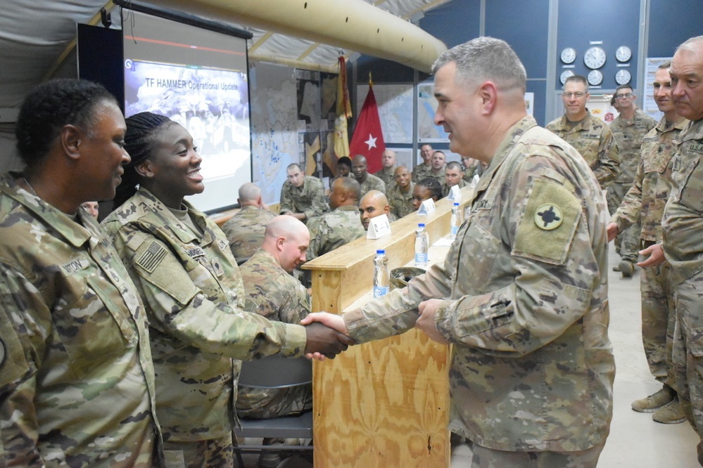 129th CSSB Soldiers Receive Coins from BG Walker