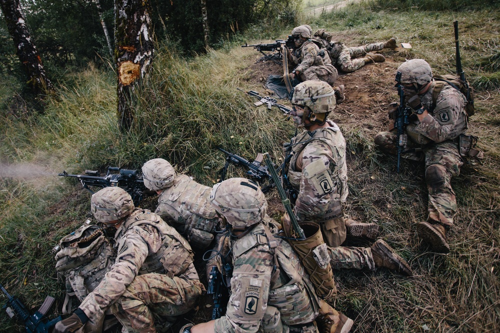 U.S. Army paratroopers react to contact
