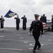 U.S. Sailors conduct a burial at sea