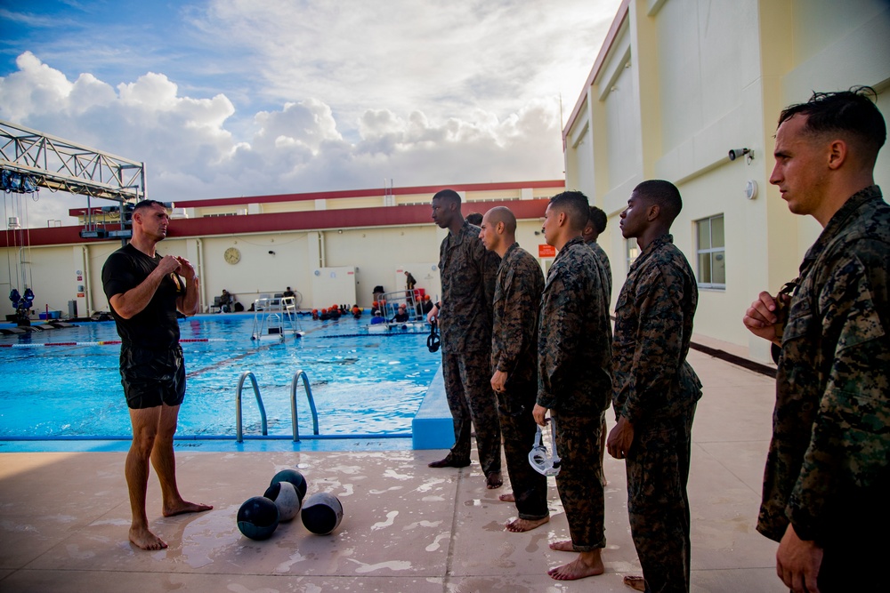 Martial arts instructor hopefuls complete pool workout