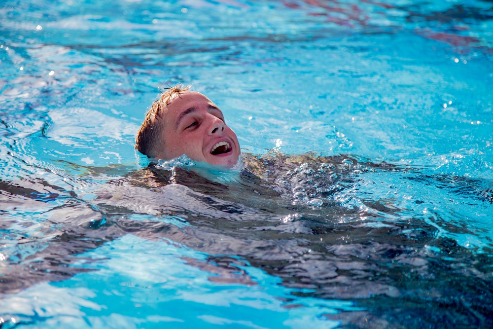 Martial arts instructor hopefuls complete pool workout