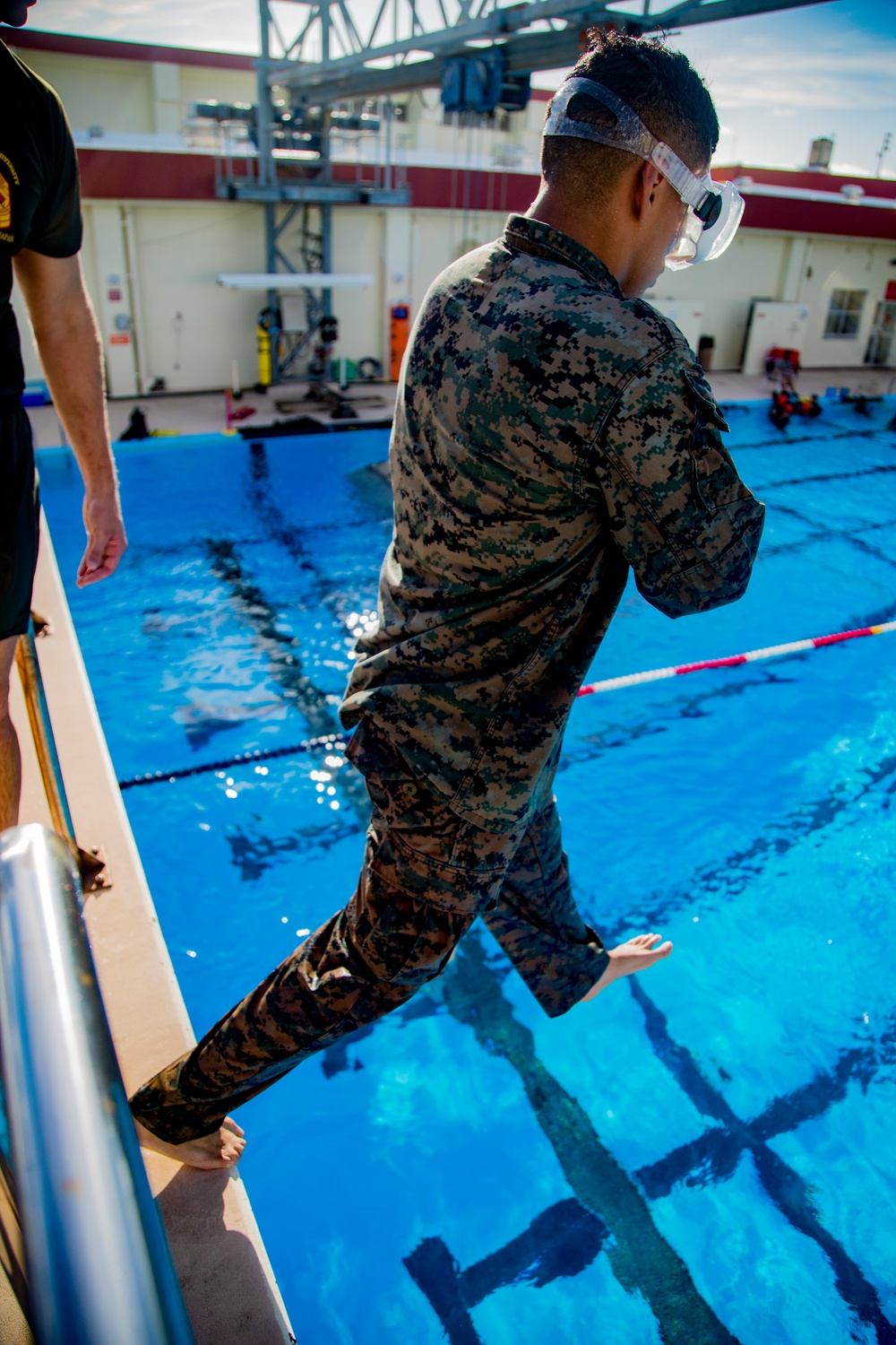 Martial arts instructor hopefuls complete pool workout